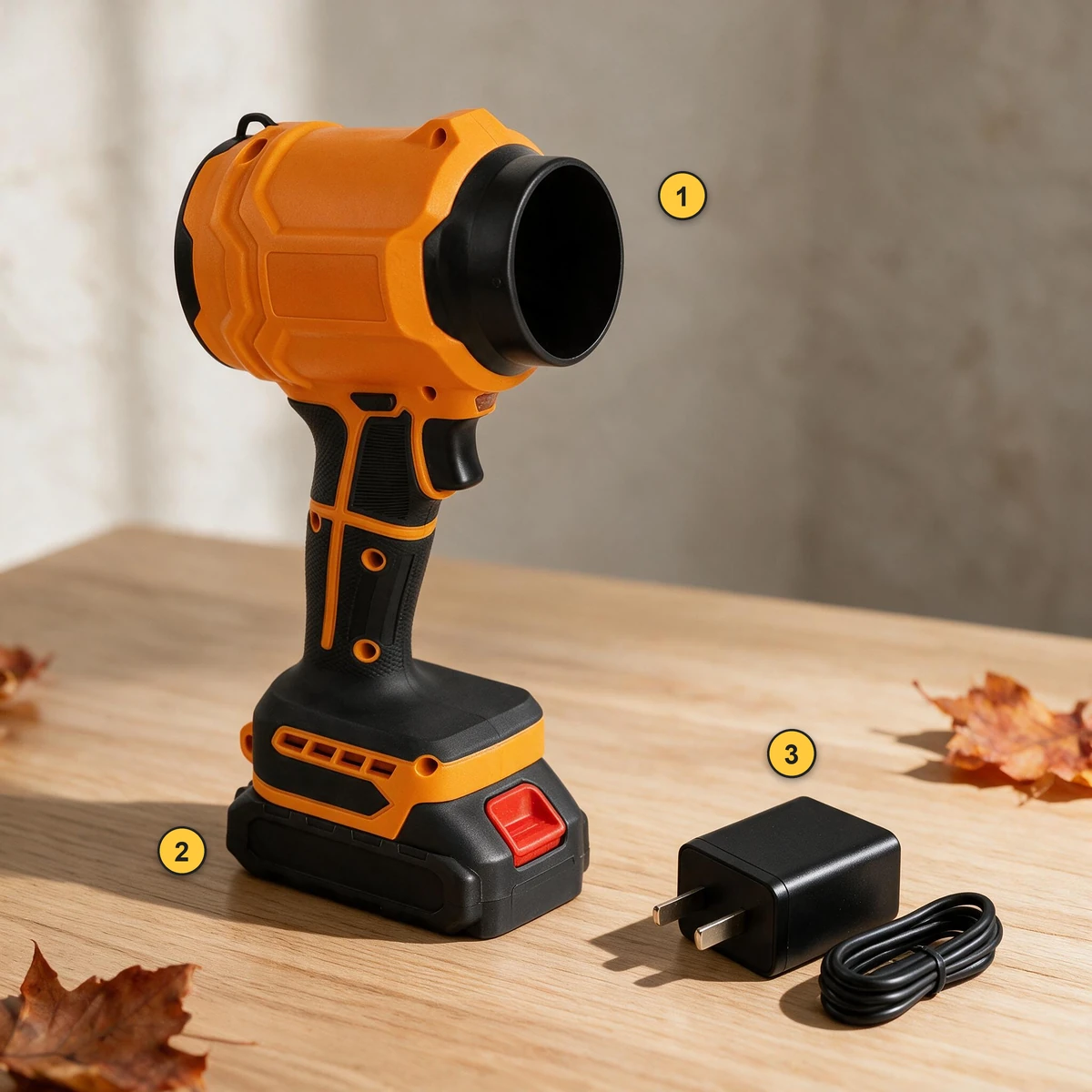 Everything in the box: the SuperLeafBlower with its 21V battery attached, and the fast charger with its cable, numbered 1 to 3 on an oak table